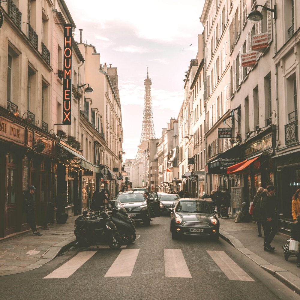 Parisian street with taxi - Photo by Earth on Unsplash